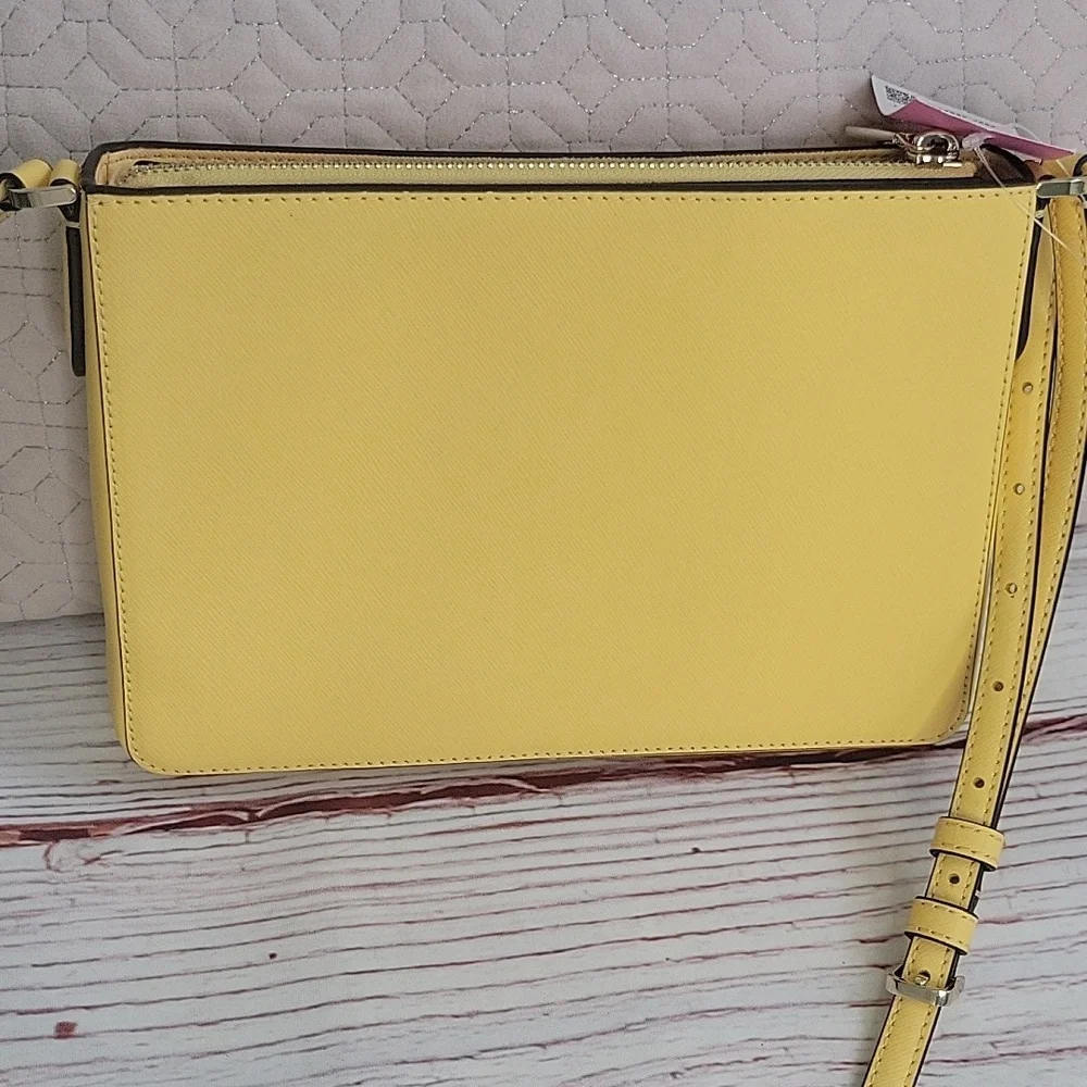 Kate Spade Butter Yellow Crossbody Bag with Minimalist Design NWT